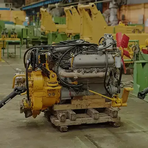 Industrial machine and mechanical parts on a workshop floor