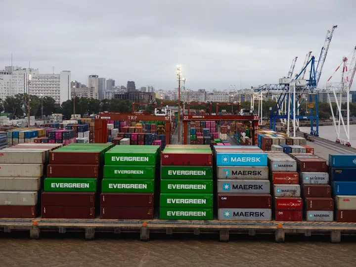 Shipping containers and cranes at a port